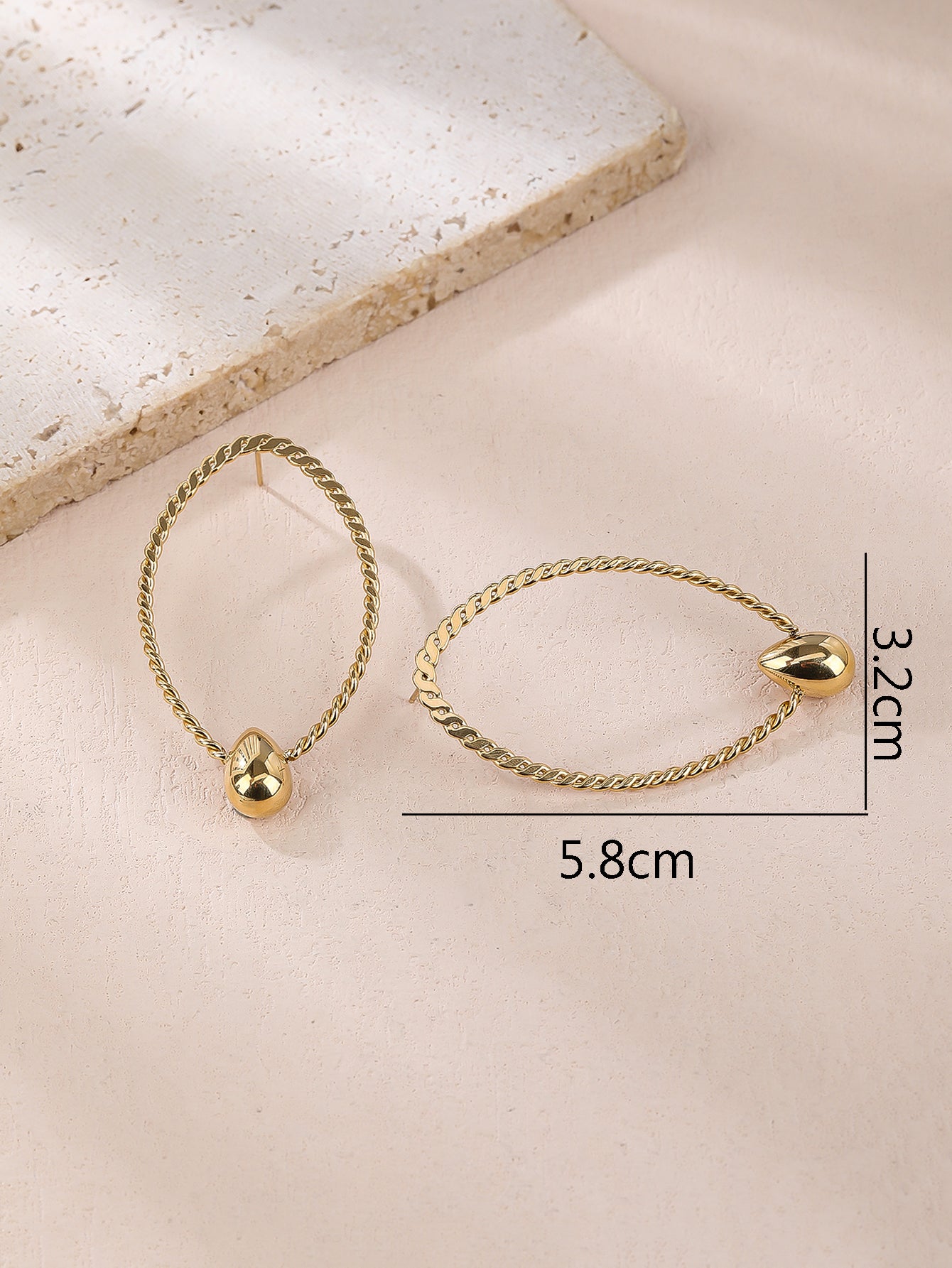 Golden Braided Oval Earrings With Teardrop
