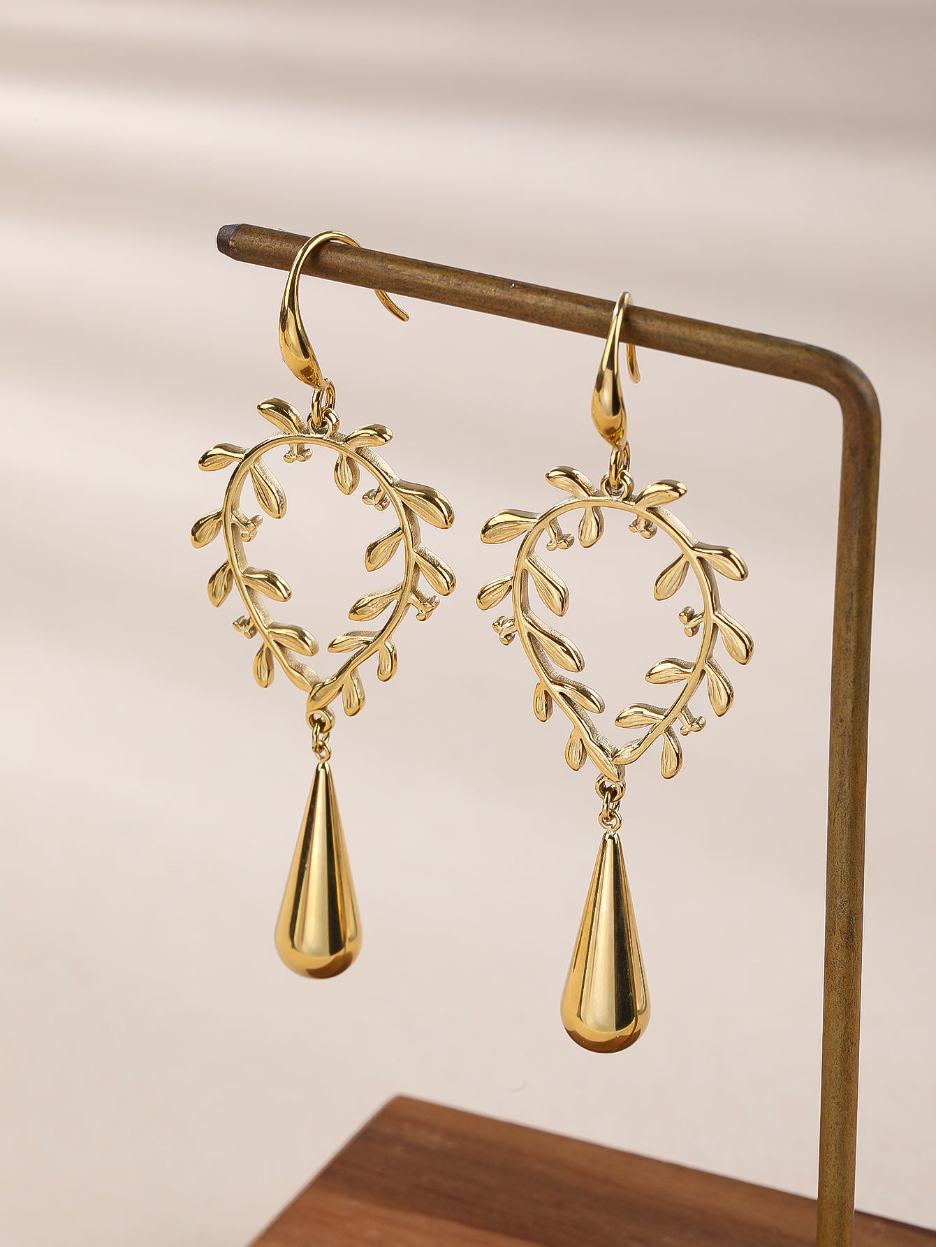 Golden Leaf Earrings With Teardrop Pendant